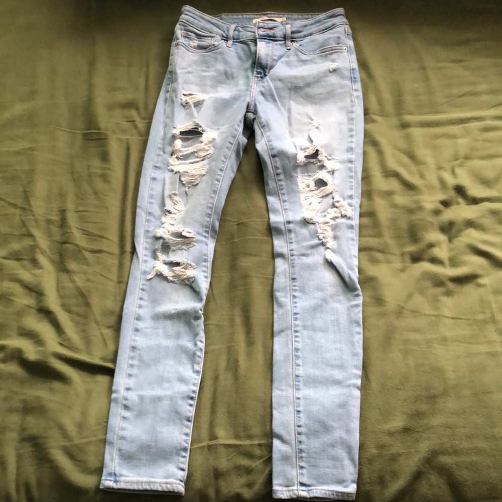 Levi 711 skinny ripped jeans
